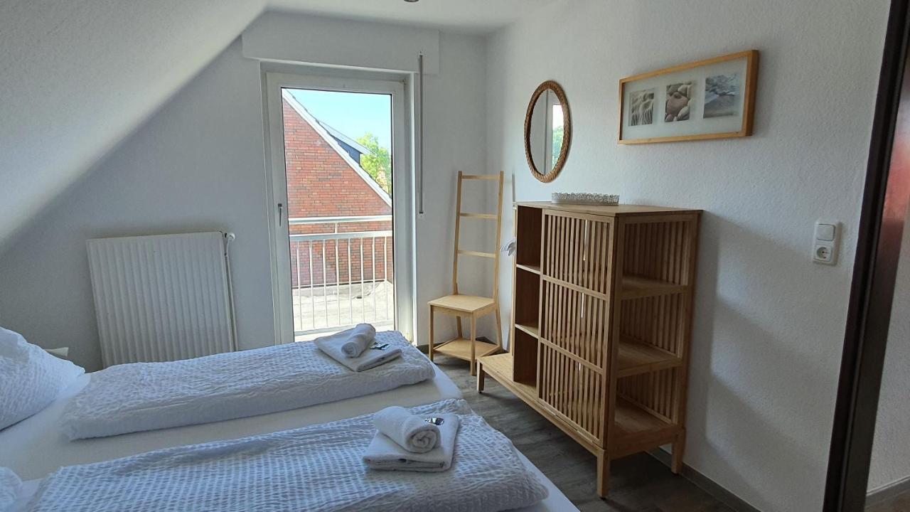 Friesenmeer Ferienwohnung Vier เบนซาซิเออ ภายนอก รูปภาพ